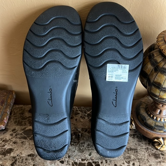 Clark’s black leather slip on shoes. - Picture 4 of 5